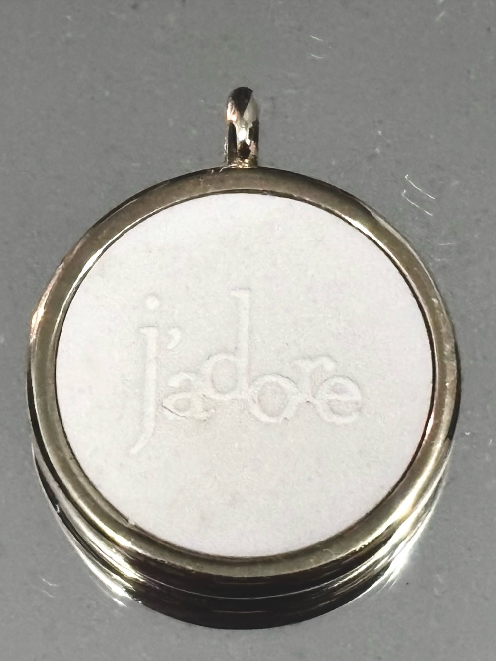 Dior J’Adore gold tone and ceramic pendant
